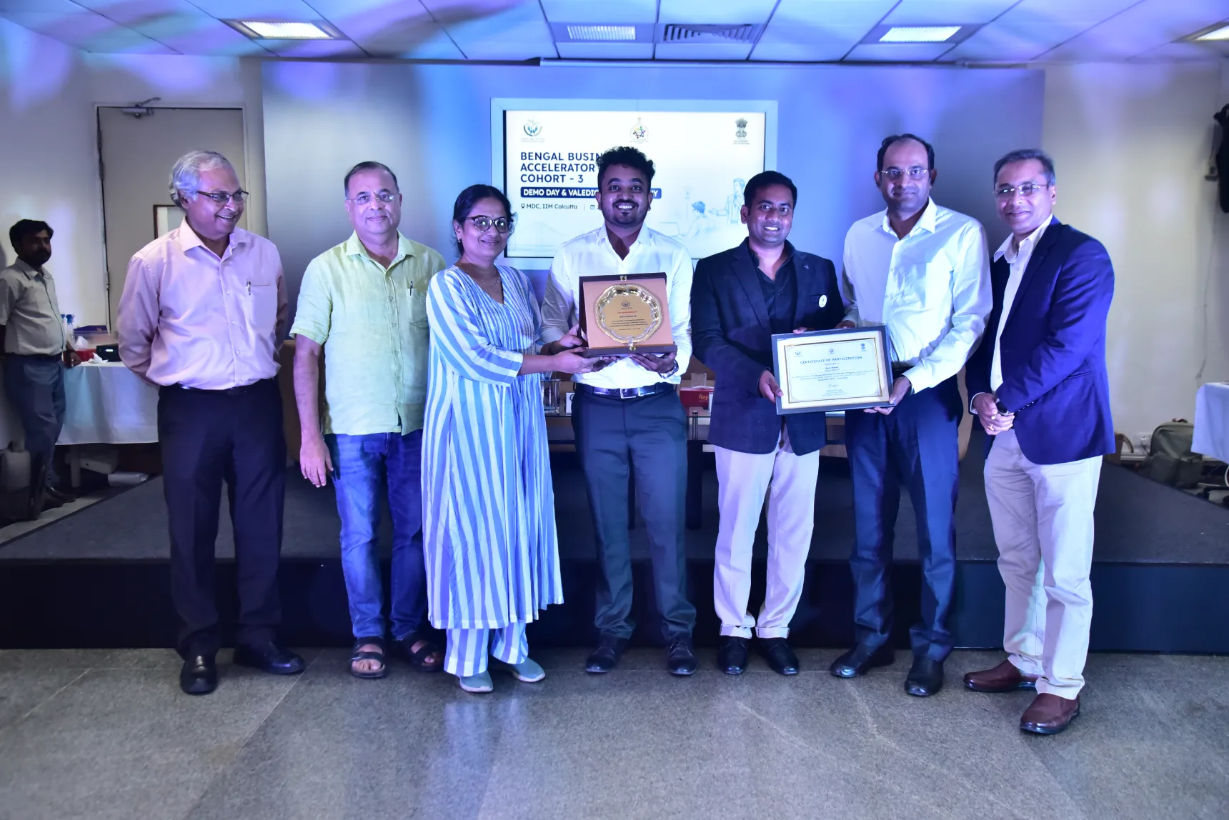 Flora Carbon AI team on stage at IIM Calcutta during Demo Day